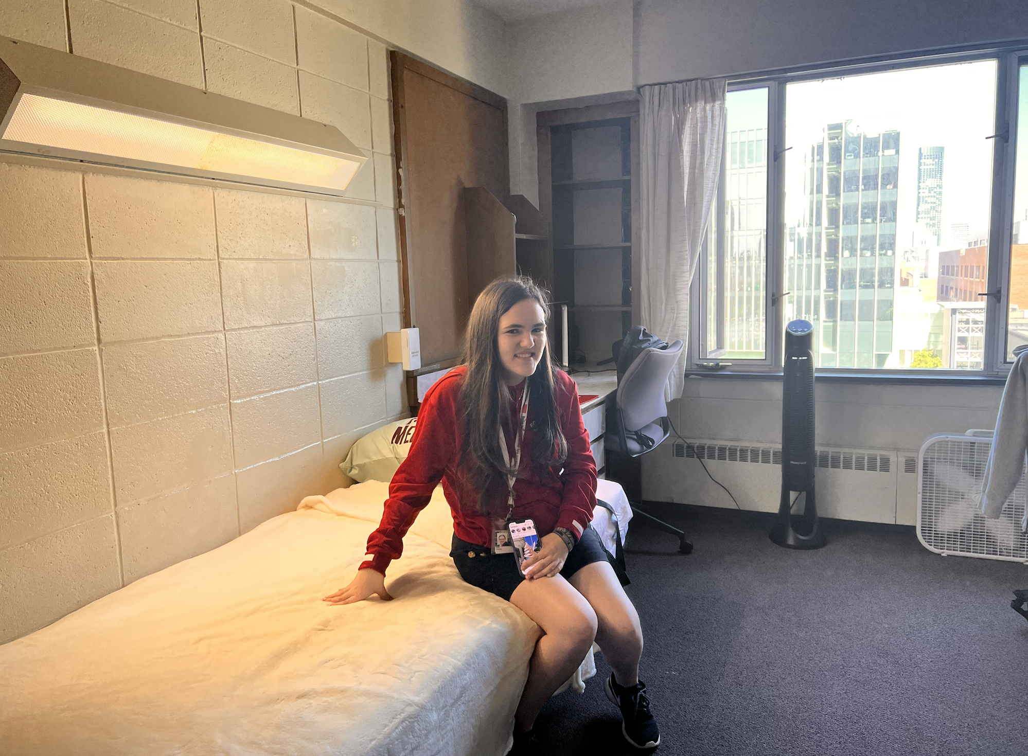 Senior Kate Cooper sits in a Boston University dorm. Cooper took advantage of the BU Summer Pre-College Programs during the summer of 2022, taking courses in the areas of international politics. According to Cooper, this experience allowed her to better understand if BU was the right fit for her.